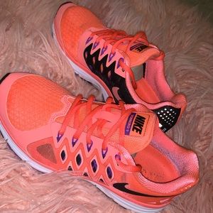 Coral and Purple Nike Running Shoe